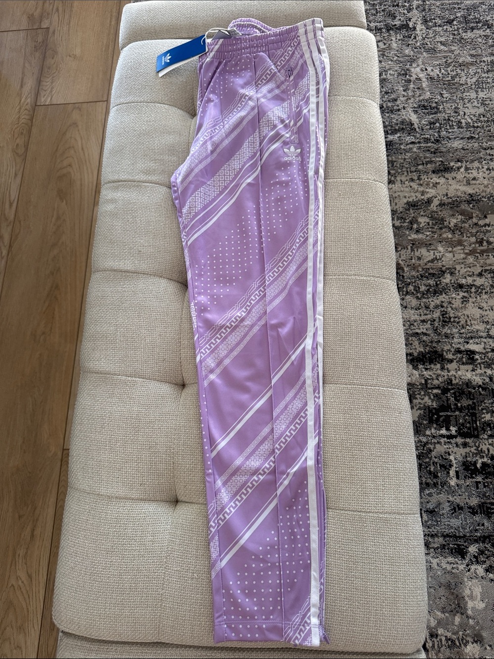 adidas women’s Lavender Track Pants with White Stripe Detail